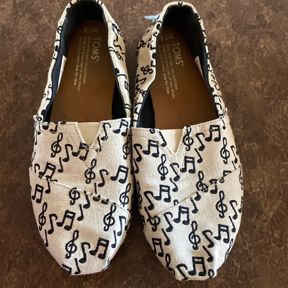 TOMS Women’s Cream Canvas Slip-On Shoes with Black Music Note Print